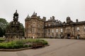 The courtyard of the Holyrood Palace, royal residence in Edinburgh, Scotland with a fountain Royalty Free Stock Photo