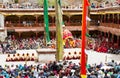 Courtyard of the monastery during the Cham Dance Festival of Tibetan buddhism, full of spectators and performers in Hemis