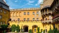 Courtyard of a neo-gothic castle on a sunny day