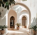 Courtyard With Potted Plants and Arched Doorways Royalty Free Stock Photo