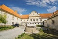 Courtyard with stone well in the back of the Migazzi family manor house in Zlate Moravce town Royalty Free Stock Photo