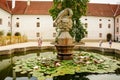 Courtyard of Trebon Castle, Renaissance chateau, palace architecture and park with fountain, sunny summer day, historical medieval