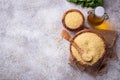 Couscous grain in wooden bowl