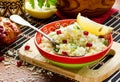 Couscous in oriental style with grains of pomegranate, lemon zest and butter