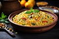 couscous salad with grilled corn kernels in a round metal bowl