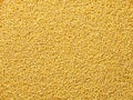 Couscous seeds flat food background