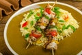 Couscous with vegetables and chicken skewer Royalty Free Stock Photo