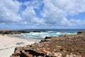 Cove with Waves Crashing Ashore in Aruba Royalty Free Stock Photo