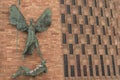 COVENTRY, ENGLAND, UK - 3rd March 2018: St Michael and the Devil sculpture by famous artist Jacob Epstein at Coventry