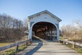 Covered American Wood Bridge on a Sunny Winter Day with Blue Sky