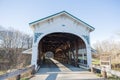 Covered American Wood Bridge on a Sunny Winter Day with Blue Sky