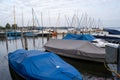 Covered boats at a port in the morning Royalty Free Stock Photo