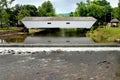 Covered Bridge and Falls Royalty Free Stock Photo