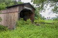 Covered Bridge And Farm In Vermont