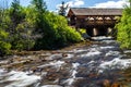 Covered Bridge over river stream Royalty Free Stock Photo