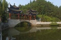 Covered bridge with reflection at enshi, China Royalty Free Stock Photo