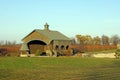 Covered bridge and a wishing well Royalty Free Stock Photo