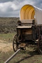 Covered chuckwagon buckboard closeup on seat and tongue