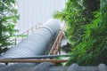 Covered conveyor belt to transport materials to indoor warehouse Royalty Free Stock Photo