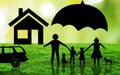 Covered Family Paper cut Concept. happy paper family under umbrella with house and car in nature grass and blurry green background Royalty Free Stock Photo