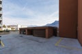 Spacious covered garage with the car door