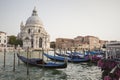 Covered gondolas on on a venetian Canal, Venice, Italy Royalty Free Stock Photo