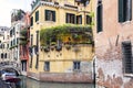 Covered gondolas on on a venetian Canal, Venice, Italy Royalty Free Stock Photo