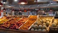 Covered indoor market in Colmar, France and a fruit and vegetable stand