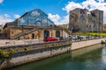 Covered market hall of Baltard style and Square tower of Romanesque keep on the bank of Sevres river in Niort, France Royalty Free Stock Photo