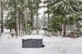 Covered outdoor hot tub surrounded by snow Royalty Free Stock Photo