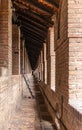 The covered passage in the fortress wall in the inner courtyard of the Sforzesco Castle - Castello Sforzesco in Milan, Italy