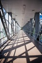 Covered Skywalk Tunnel with the Sun Shining Royalty Free Stock Photo