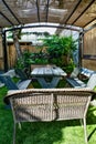 Covered Tropical Outdoor Sitting Area With Table and Benches Royalty Free Stock Photo