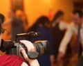 Covering an event with a video camera Royalty Free Stock Photo