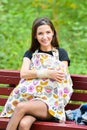 Covers the baby during feeding. Closeup young european mother is breastfeeding her newborn baby and is using breastfeeding cap in Royalty Free Stock Photo