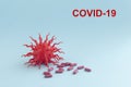 Covid-19 blue abstract background. Dangerous Coronavirus distribution model and hand. Pandemic COVID-19. Close up. Copy space