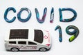 COVID 19 concept, ambulance for transport covid patients to  hospital , Covid 19 new epidemic disease in the world.Ideas from toys Royalty Free Stock Photo