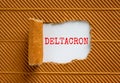 Covid-19 corona deltacron symbol. The concept word Deltacron appearing behind torn brown paper. Beautiful brown and white