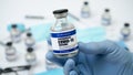 Covid-19 Corona Virus 2019-ncov Vaccine vials medicine drug ampoule bottle closeup syringe injection medical nitrile gloves mask