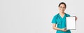 Covid-19, coronavirus disease, healthcare workers concept. Smiling pretty asian female physician, nurse showing test Royalty Free Stock Photo