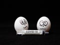 Covid-19 and coronavirus eggs drawn frightened faces alcohol syringe