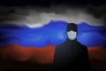 COVID-19 coronavirus epidemic in russia. Silhouette of man in medical mask on abstract russian flag background. Global COVID-19