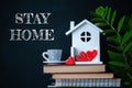 COVID-19 Coronavirus STAY HOME social media message, COVID-19 staying at home concept. Cute home interior, hearts in the house,