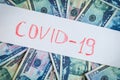 COVID-19 coronavirus in the United States, 50-dollar bills with the inscription covid-19. Royalty Free Stock Photo