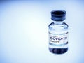 Covid-19 Coronavirus vaccine bottle with label