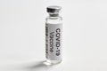 COVID-19 coronavirus vaccine on white background, bottle with vaccine for SARS-CoV-2 coronavirus cure