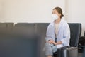 COVID-19 Crisis, Asian travelers girl and surgical mask in airports