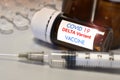 Covid-19 Delta variant strain vaccine. Syringe and vaccine. Treatment for coronavirus covid-19 Royalty Free Stock Photo