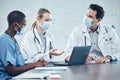 Covid, doctors and team with laptop working together on medical, medicine or covid 19 vaccine research. Collaboration Royalty Free Stock Photo