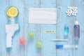 COVID-19 . A flatlay of CoronaVirus protection and measurement concept including surgical mask, temperature thermometer, pills Royalty Free Stock Photo